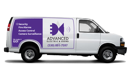Advanced Electric and Sound van is white with purple decals.